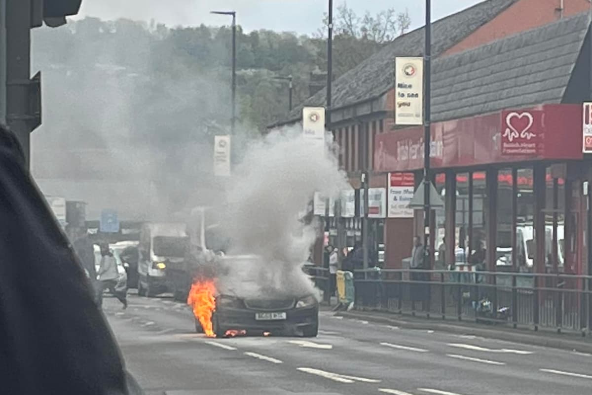 Car ablaze in Sheffield as firefighters close major road 