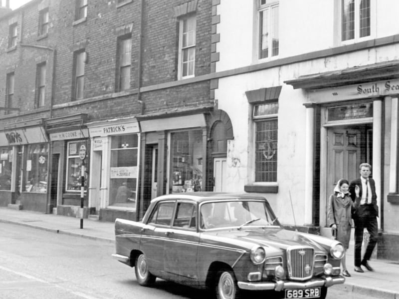 Shops on Fulwood Road, Broomhill, in September 1966, showing Arthur Davy and Sons provisions dealers, Horace W. Cooke watch repairer and the South Sea Hotel