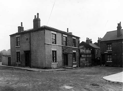 May 1958 To the left is Buslingthorpe Lane. G.W. Binns Leeds Ltd have a commercial garage here, at the end of Raby Mount. This company also had a garage on Meanwood Road, situated at the opposite end of Buslingthorpe Lane. Pictured in May 1958.