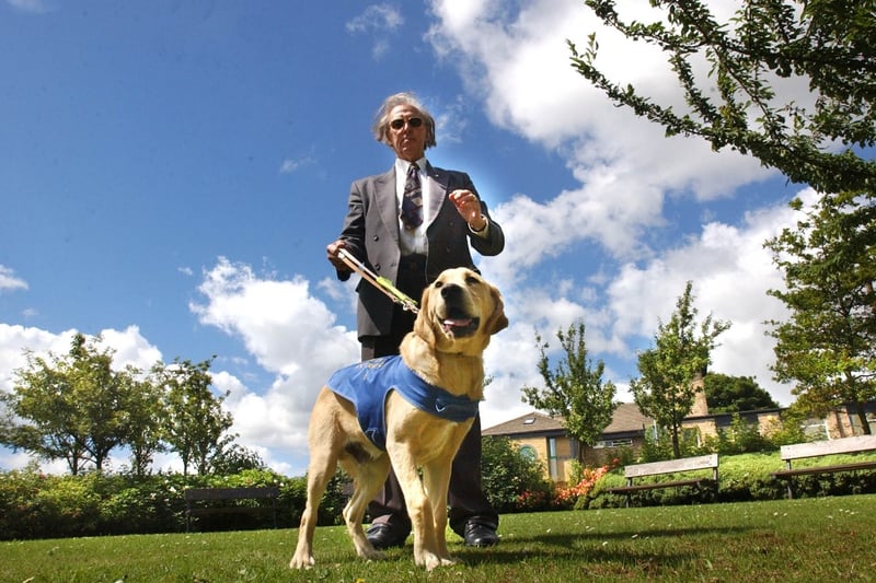 Trainee guide dog Leo posed for this photo with the chairman of Easington District Council, Coun Bruce Burn, in July 2004.