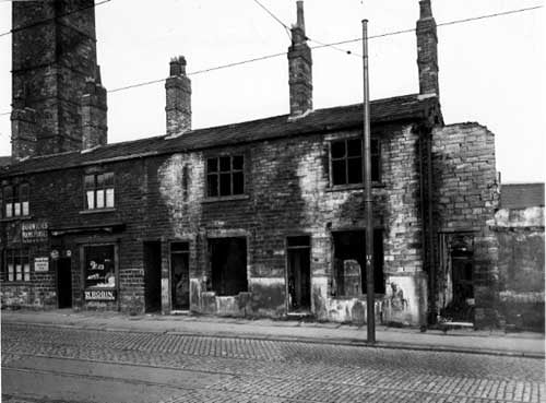 Derelict house number 294 and E. Wilson's bakers at number 286 Meanwood Road in November 1951. Tram lines can be seen.