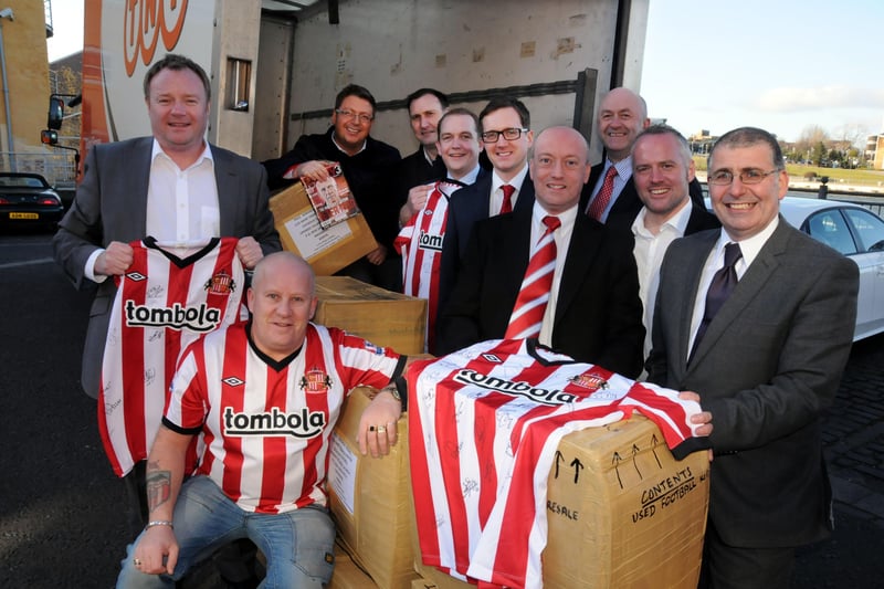 Gary Lamb (front left) with sponsors who funded 500 Sunderland football shirts in February 2012.
The shirts were sent off to a Kenyan football team. 