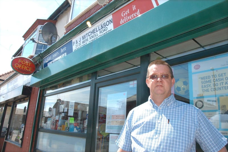 Paul Mitchell outside the Mere Knolls post office in a view from July 2008.