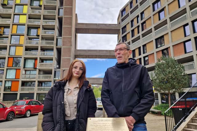Jason Lowe beneath his famous graffiti proposal at Sheffield's Park Hill flats where he has unveiled a plaque in memory of Clare Middleton (inset), from whom it was written. Beside him is Clare's sister, Jodie Ashworth.