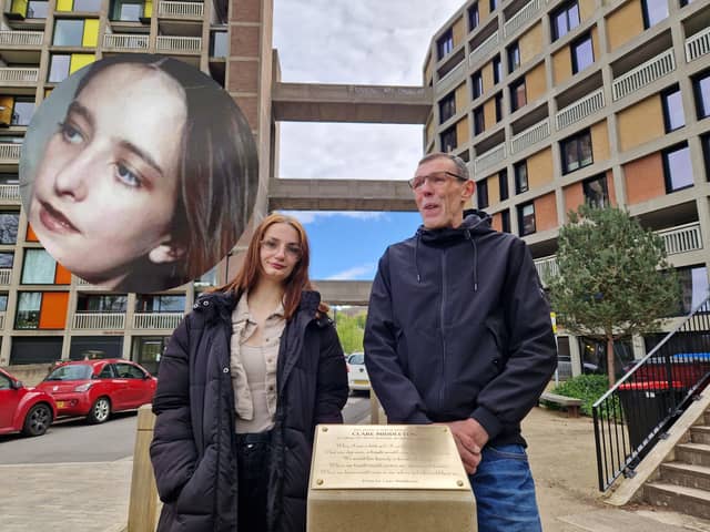 Jason Lowe beneath his famous graffiti proposal at Sheffield's Park Hill flats where he has unveiled a plaque in memory of Clare Middleton (inset), from whom it was written. Beside him is Clare's sister, Jodie Ashworth.
