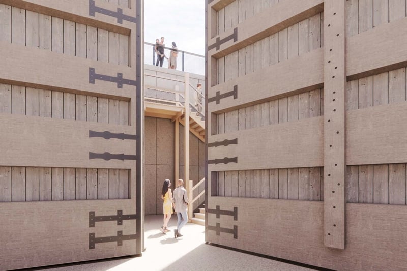 A staircase and lift built behind timber gates will enable visitors to descend into the site.