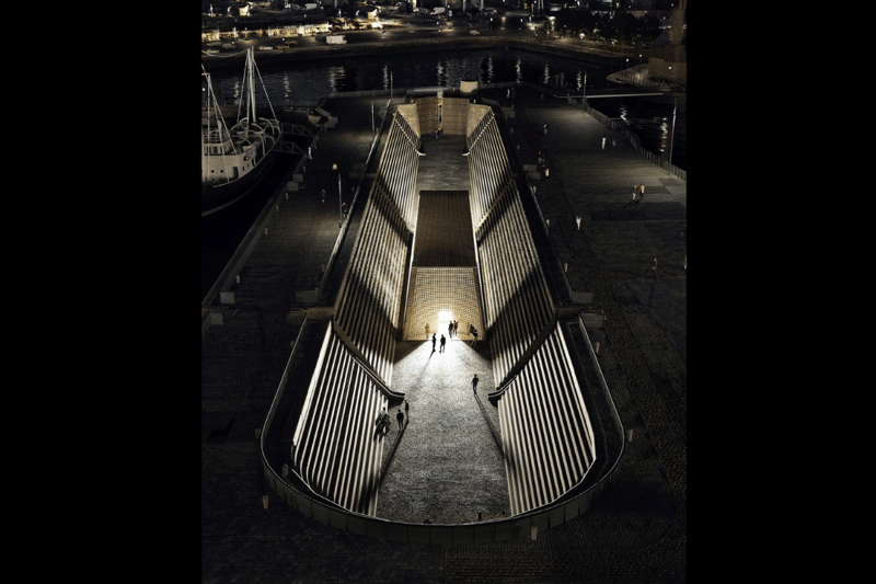 A view of the dry dock illuminated at night.