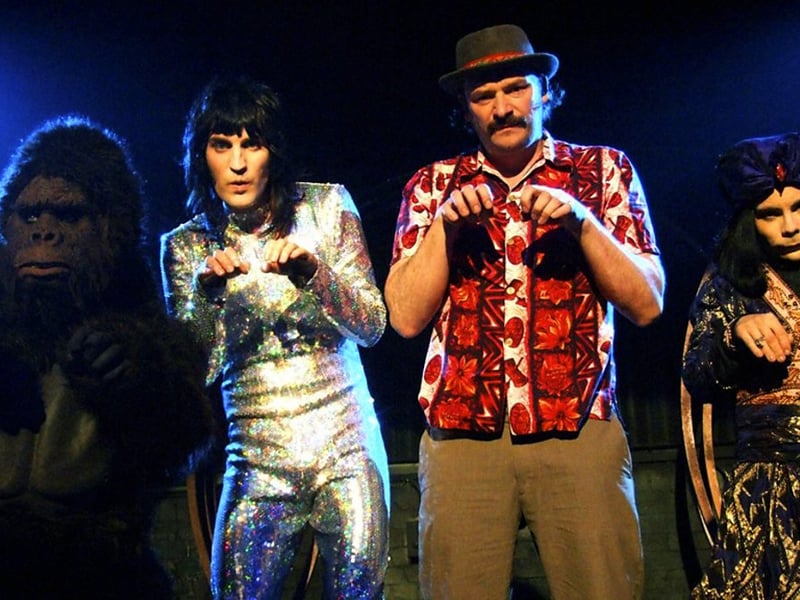 First appearing at the Edinburgh Festival Fringe in 1997 as part of a Stewart Lee show, Noel Fielding and Julian Barratt returned the next year with their own sketch show, The Mighty Boosh, winning the Edinburgh Comedy Award for Best Newcomer. More live shows followed - with Arctic Boosh in 1999 and Autoboosh in 2000. A television deal was then signed with the BBC, with three series of their madcap adventures that are still beloved today.