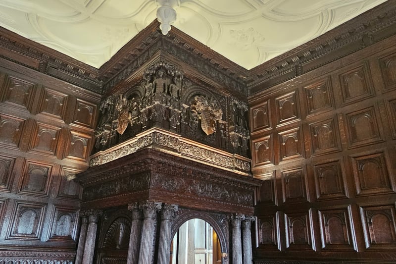 Located on the first floor, the Great Oak Room has its original panelling, and plasterwork ceiling and is the oldest example of 16th-century interiors left in Bristol. It's described as one of the finest Elizabethan rooms in the West Country and was used for banqueting. The first owner of the Great House and Red Lodge, Sir John Young, was a merchant and the ornamental details on the wooden walls show off his voyages with exotic fruits like pineapples and native Americans depicted on the wooden panels to name a couple. A portrait of Queen Elizabeth I from the last quarter of the 16th century is displayed in the room and is on loan to Red Lodge. Queen Elizabeth I stayed in The Great House during a visit to Bristol instead of at the Ashton Court Estate, which was owned by the bitter rival of Young.