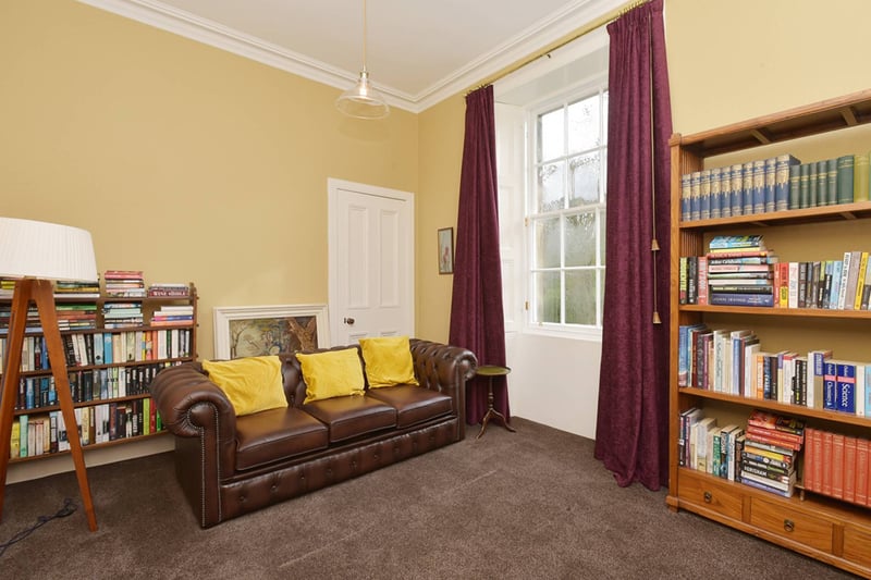 The property's fourth bedroom, also situated on the first floor, is currently used as another reception room.