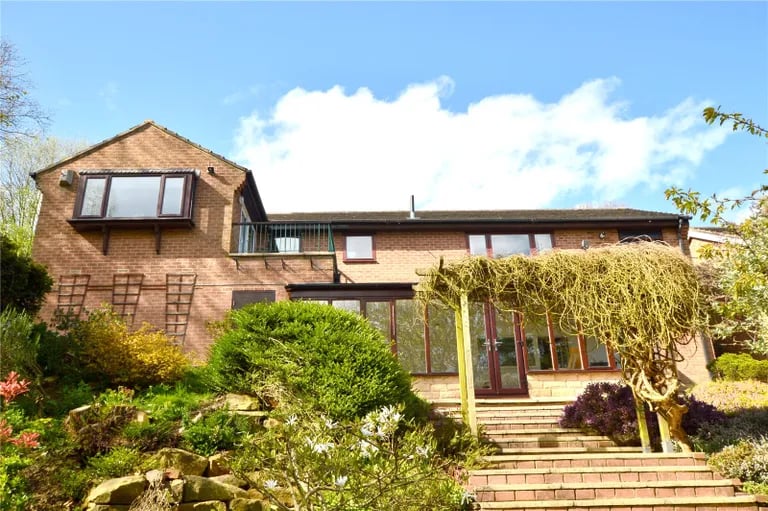 This gorgeous house situated in a small enclave in Bramley is on the market.