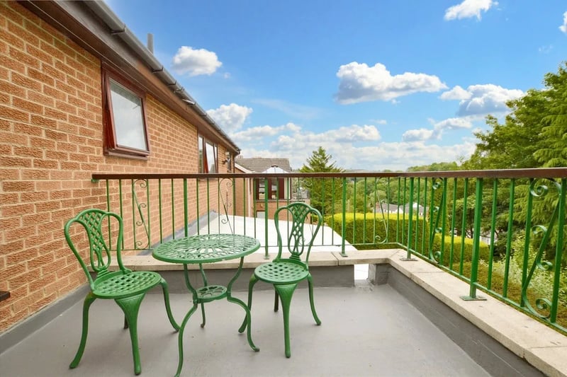 There is also a balcony situated behind the living room overlooking the gardens.