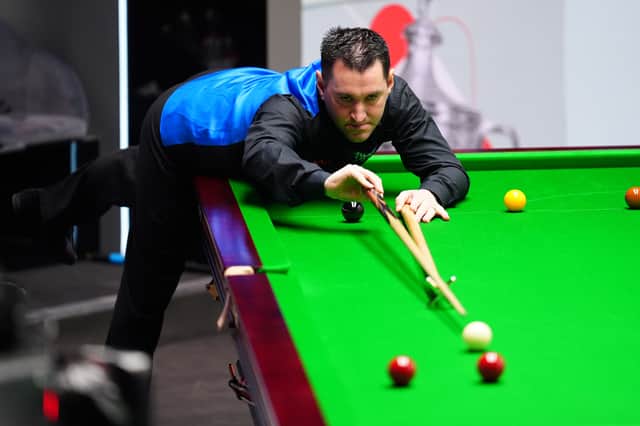Tom Ford in action against Judd Trump on day six of the 2024 Cazoo World Snooker Championship at the Crucible Theatre, Sheffield. Photo: Mike Egerton/PA Wire.