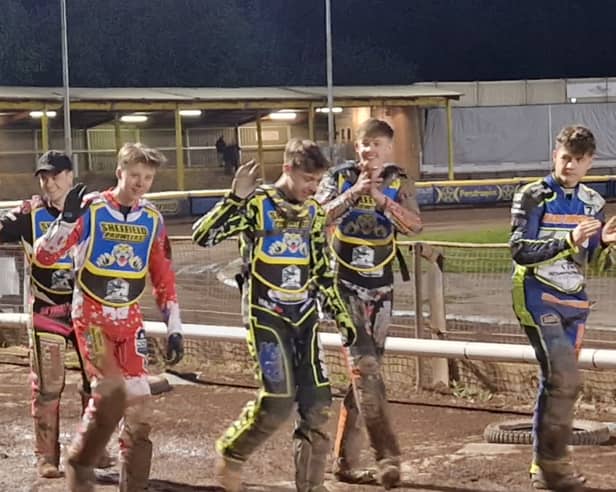 Members of the Sheffield Tigers cubs applaud the crowd after winning their first meeting of the National Development League season