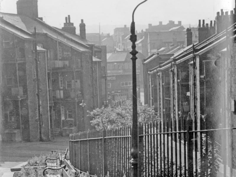 The access road to the rear of the Townhead Street Flats (left) and Hawley Street Flats (right), looking towards Broad Lane, Sheffield city centre, during the 1960s