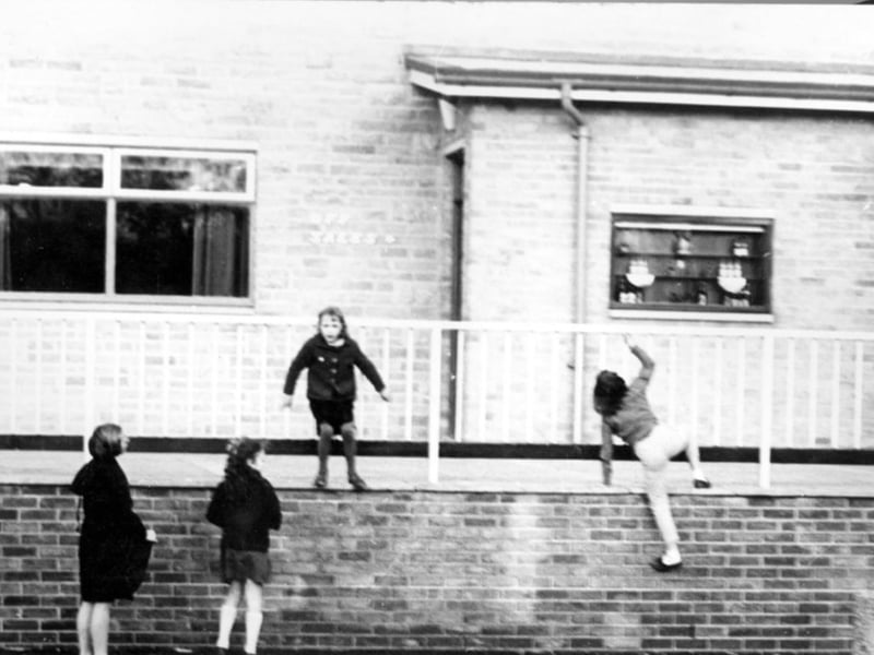 Children playing outside the Far Lees pub on Leighton Road, Gleadless Valley, during the 1960s