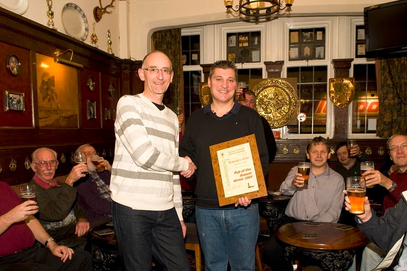Blackpool, Fylde and Wyre CAMRA branch chairman Ian Ward (l) presents the Pub of the Season (winter 2009) award to Ramsden Arms landlord Brian Luxton
