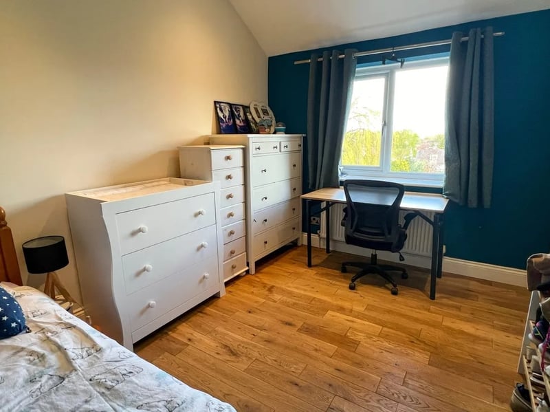 The other bedroom offers a versatile space with study potential if it isn't needed as a bedroom.
