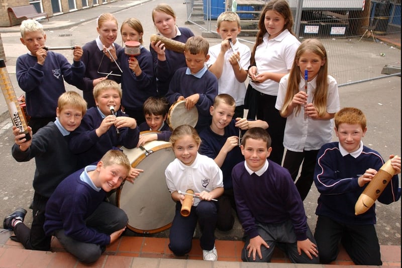 We're banging the drum for these pupils who were preparing for a concert in July 2003.