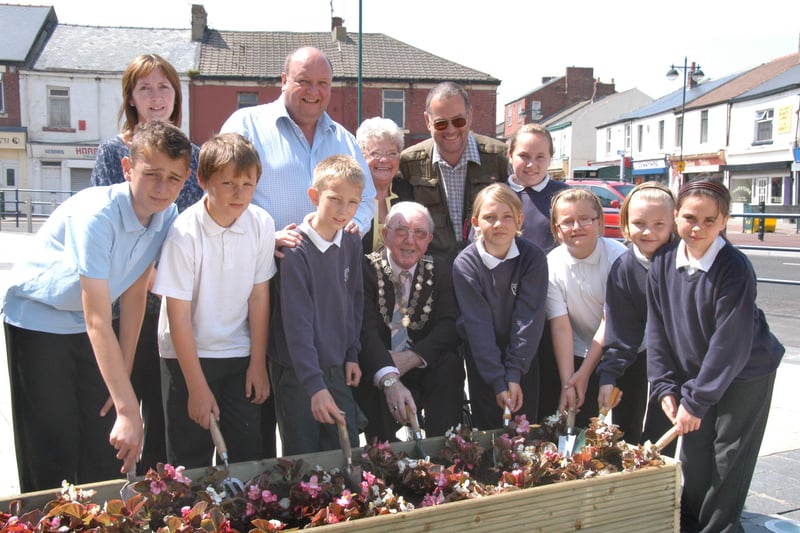 Well done to these young students who planted a new flowerbed outside Byron Place Shopping Centre in July 2008.