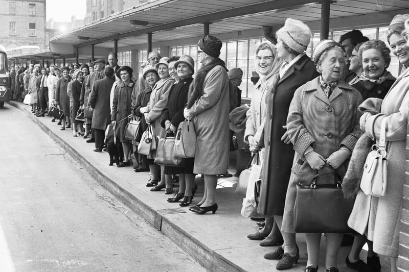 Holidaymakers queue up for buses to Fife at St Andrew Square bus station in Edinburgh in May 1966.