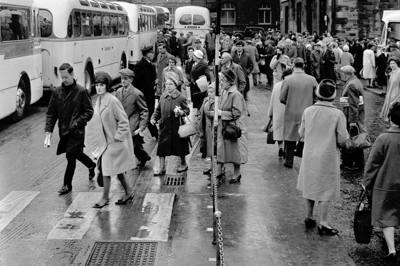 Holidaymakers throng St Andrew Square bus station in Edinburgh during the Spring Holiday weekend in 1964