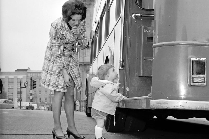 Toddler Colin Carmichael needs a bit of help from his mum getting onto the bus in St Andrew Square bus station Edinburgh in May 1970.