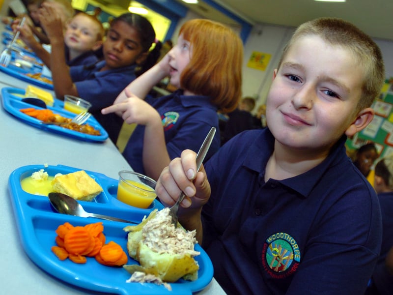 Woodthorpe Primary School School Meals.....Pupil Daniel Mitchell tucks into lunch in 2006. Photo: Steve Ellis, Sheffield Newspapers