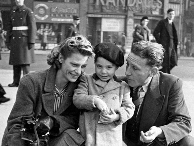  A stylish Charles Robert Watts aged 2 with his mother Lillian and father Charles in Trafalgar Square in 1943. Charlie was known as Charlie Boy- while his dad was called Charlie. 