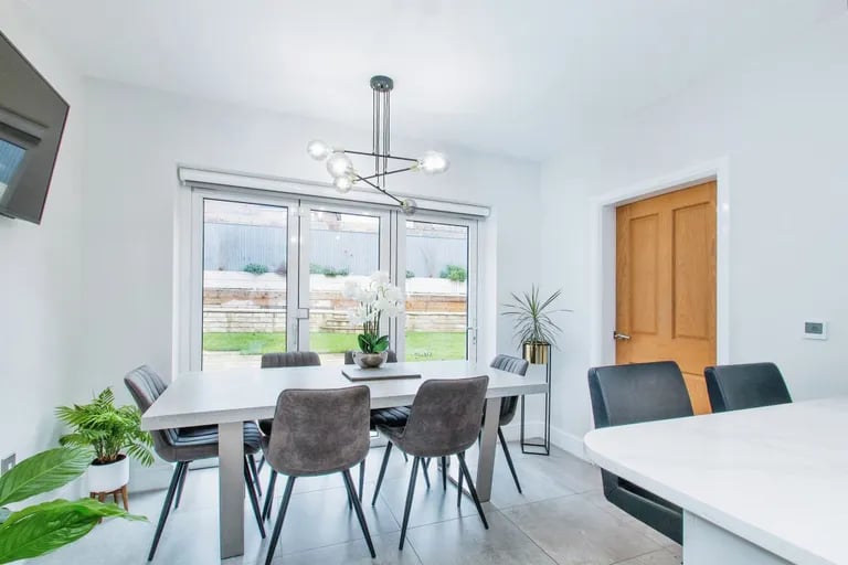 The dual aspect room also has a dining area with bi-folding doors onto the garden.