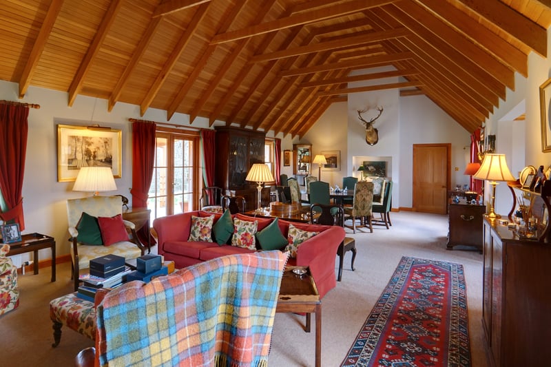 Interior: Two hallways lead to Backharn’s traditional-style kitchen and family room, complete with cosy wood-burning stove. There is a drawing room with full-height ceiling and six bedrooms, one of which is in use as a study.