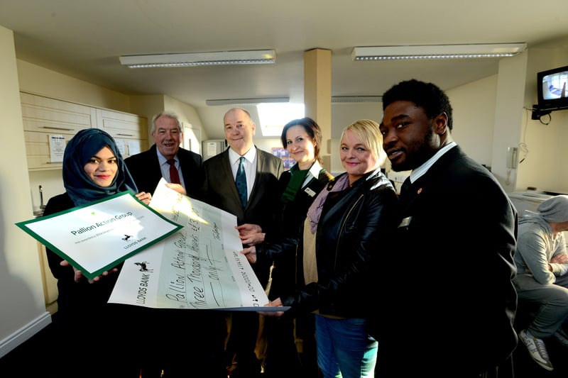 Pallion Action Group received a donation from the Lloyds Bank Community Fund in 2014.
Handing over the cheque were Lloyds representatives  Marie Cives, third right, and Tai Balagun, far right.