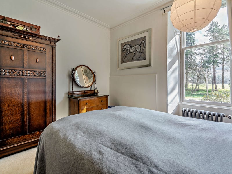 Interior: Dalnasgadh’s generous reception hall features a stunning wood-carved staircase. There is a large bay-windowed lounge, dining room, study, family room, and kitchen, while all five bedrooms are well proportioned and found on the first floor.