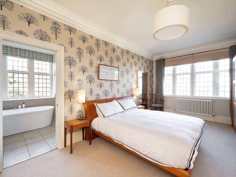 The bedrooms are generous in size and have ample storage.