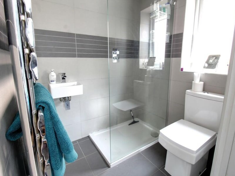 The master en-suite is equipped with a sink, shower and toilet.