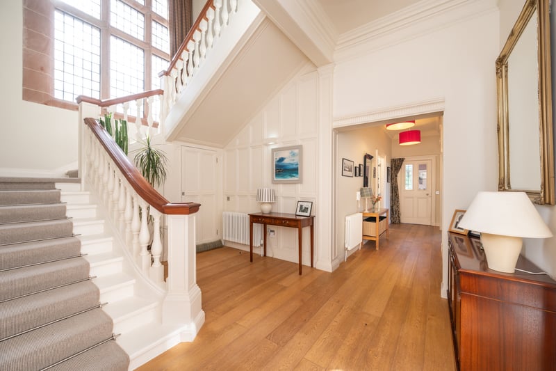 Original features include fireplaces in four rooms, elegant columns in the kitchen, a Jacobean-style broad staircase, which originally served the whole building, and leaded pane windows that ensure the home is bright throughout the day.
