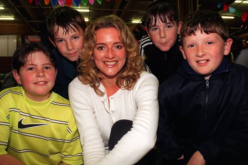 Sky TV presenter Gabby Yorath attended the school's Centenary Gala in June 1997. Pictured looking on at the back, from left, are Richard Heatley and Daniel Whittaker. Front, from left, are Chris Baker and Asquith.