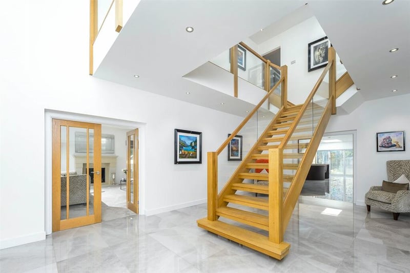 The entrance hall is well-lit and welcomes you to the family home.