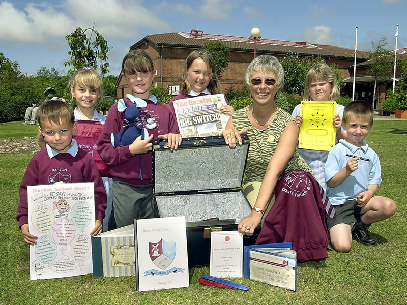 Pictured with the new items for their time capsule, (at Marton Primary School, Blackpool), are from left, Connor Jordan, Ella Norton, Rachel Brown, Natasha Wright-Pope, Mrs Lynn Lancaster (headteacher), Jessica Quinn and Adam Booth