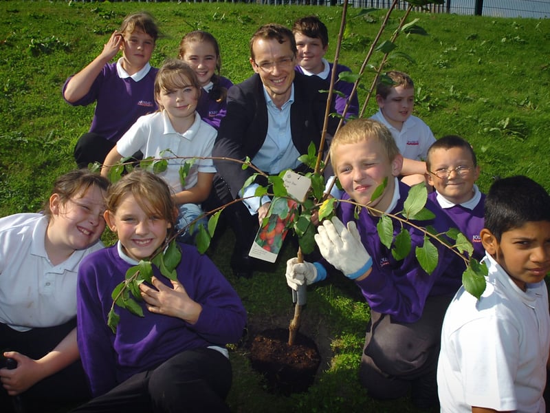 The Director of the Public Health Primary Trust Dr. Andrew Howe was at Boundary Primary School in Blackpool to officially open their new allotment. Dr Howe helps with the tree planting