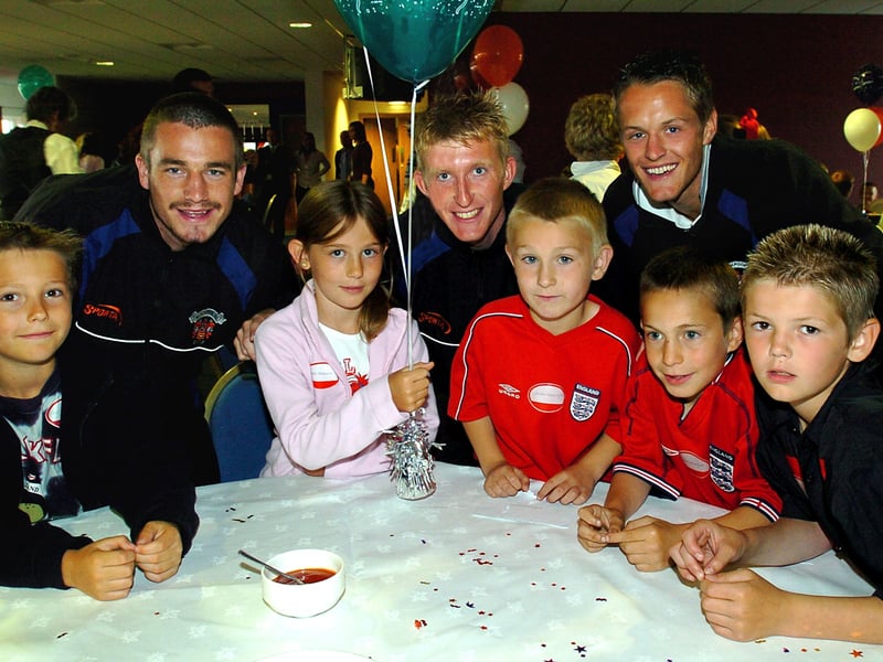 Attendance evening celebrations at Blackpool FC. Back, from left , Blackpool FC players Keigan Parker, Jamie Burns and Matthew Blinkhorn. Revoe Primary School pupils, from left, William Duncalfe, Hannah Anderson, Jordan Everington, Ryan Everington and Tommy-Joe Hartley.