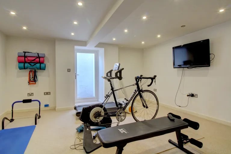 The large home even has room for a private gym.
