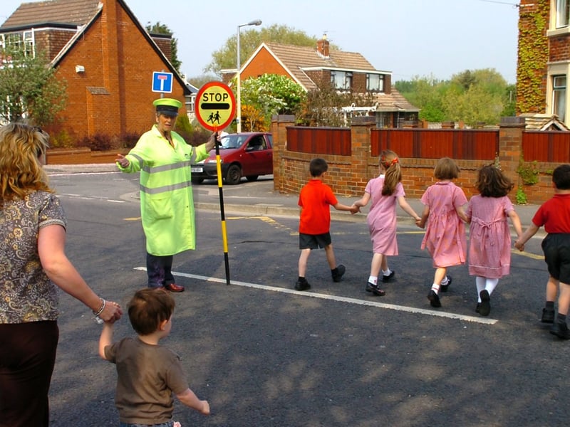 'Lollipop Lady' Bridie Matley outside our Lady of the Assumption Catholic Primary School, Blackpool. / school crossing patrol