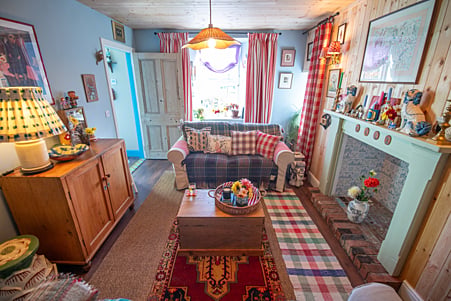 Homeowner Rachel stripped the property back to brick, restoring every room. Today, the two-bedroomed house incorporates Rachels love of bold patterns, bright colours and second-hand furnishings.