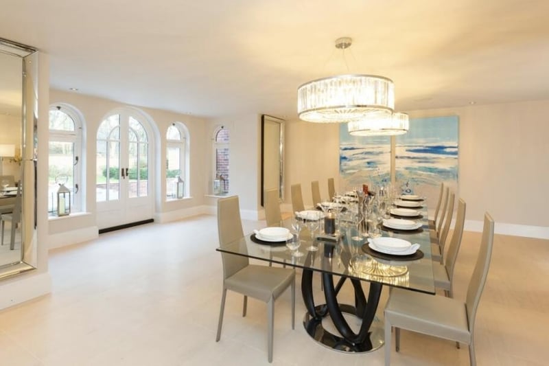 The property features a large bright dining room with a spacious garden room.