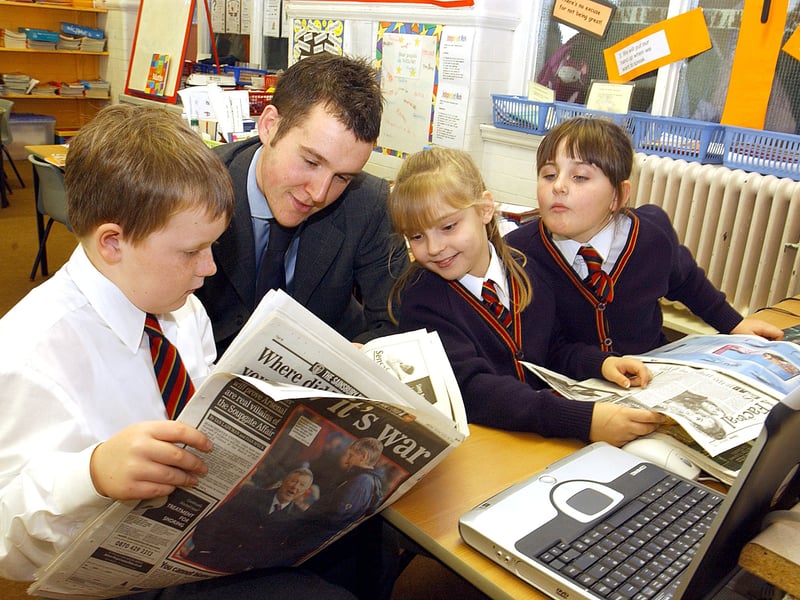 Former Gazette reporter Andy Sykes talks to children at Waterloo Primary School in Blackpool about life working at a newspaper. L-R are Sophie Fletcher (9), Rachel Clarke (9) and Ryan Clarkin (8)