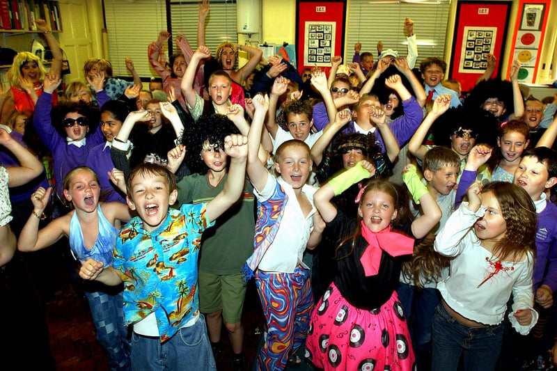 Centenary celebrations at Thames Primary School, South Shore, Blackpool. Year five pupils enjoying a '70's party