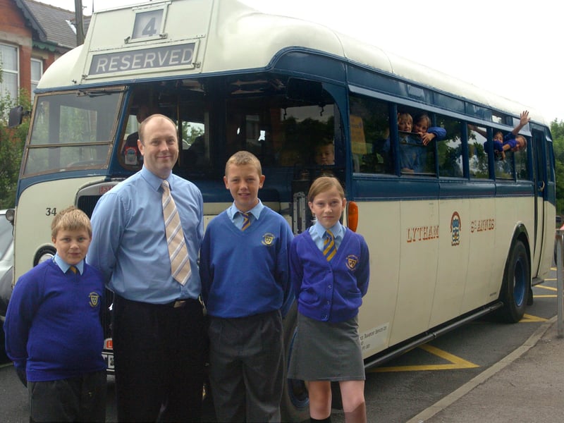 Pupils at St Nicholas Primary School in Blackpool are being picked up by an old fashioned bus and taken to see a 1940s film at the Odeon. L-R Joseph Stevenson, headteacher Andy Mellor, Emma Bowes and Luke Norris