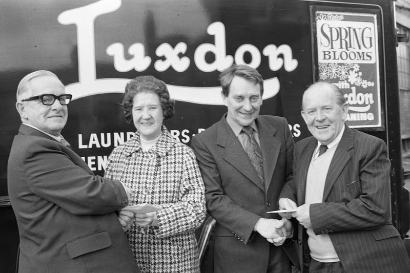Retiring from Luxdon Laundries in 1979 were two van salesmen - Jim Trotter, extreme left, and Arthur Graham, extreme right. 
They were joined for a photo by joint managing director, Florence Howey, and chairman J K Lumsden-Taylor.