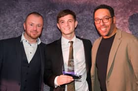 The Star's Young Player of the Year Award winner James McAtee with former Blade Carl Asaba (right) and Gavin Page from sponsors IPM Group